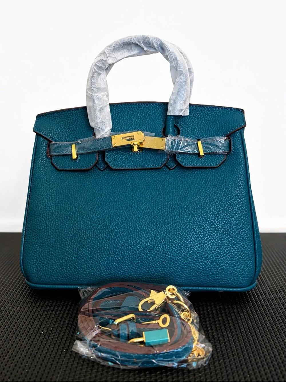 Bleu Jean Real Leather Top-Handle Bag With Gold Hardware.